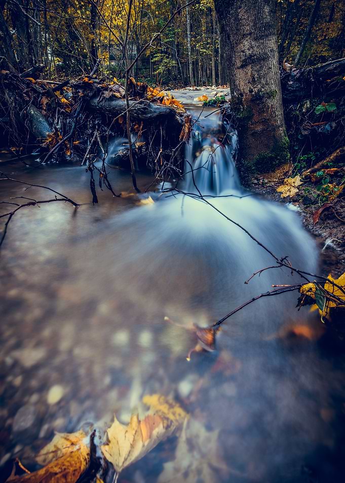 Waterfall in autumn forest