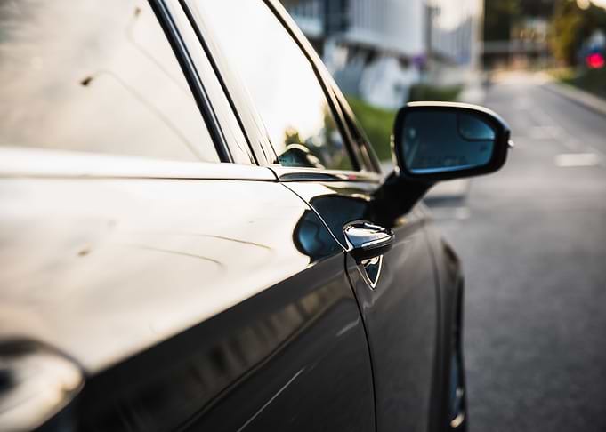 Car mirror and street