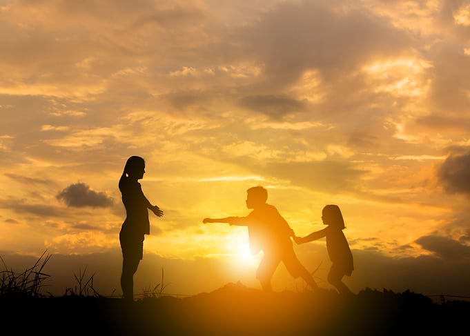 Mother and kids playing