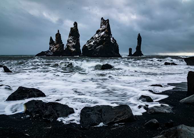 Troll toes on black beach