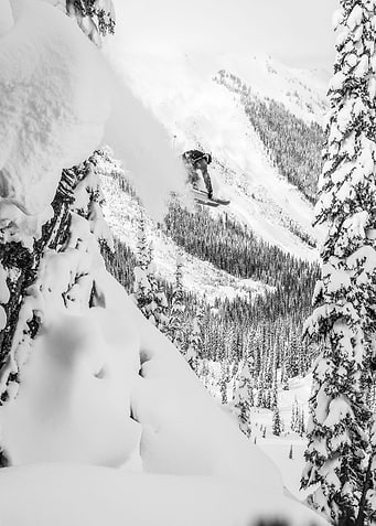 Skier going off cliff
