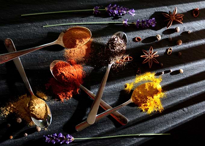 spices on spoons top view