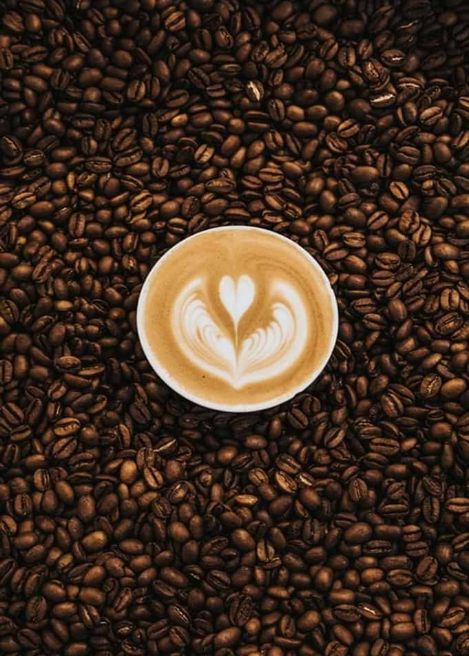 Coffee cup heart beans