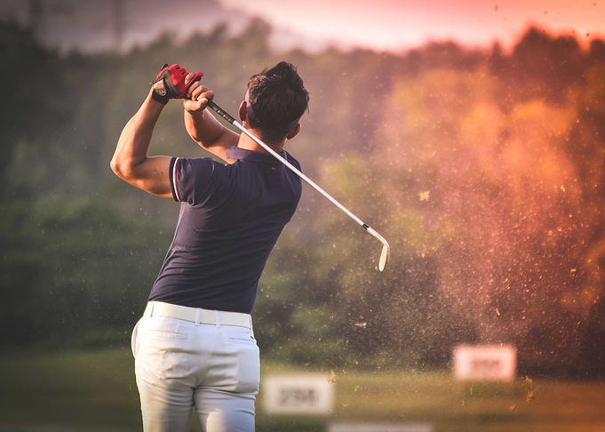 Man playing golf