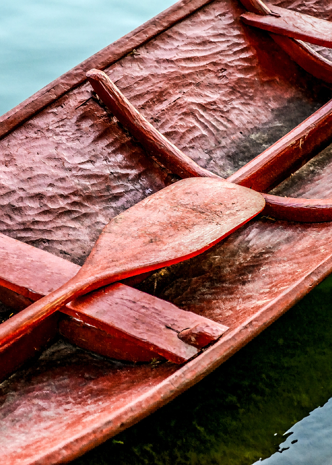 Red Boat And Paddle