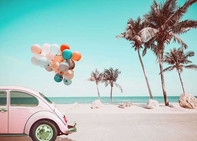 Retro car baloons beach