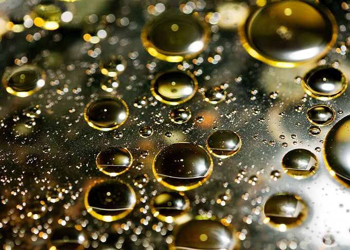 Oil bubbles on water macro