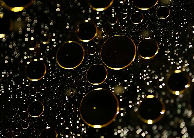 Oil bubbles on water macro