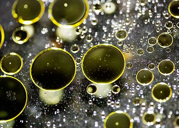 Oil bubbles on water macro