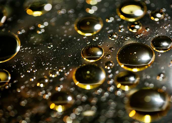 Oil bubbles on water macro