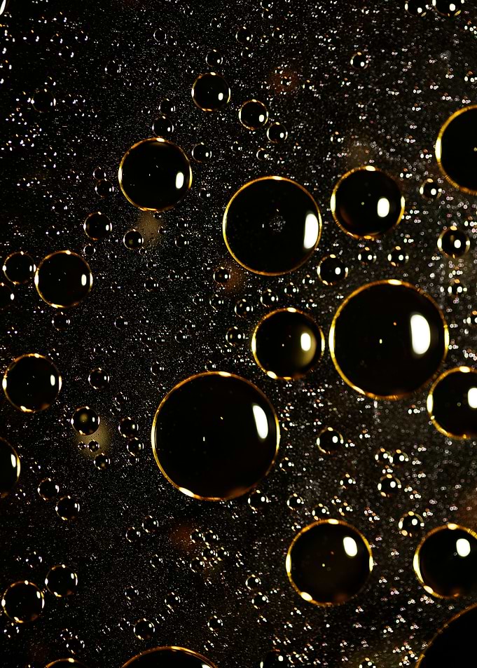 Oil bubbles on water macro