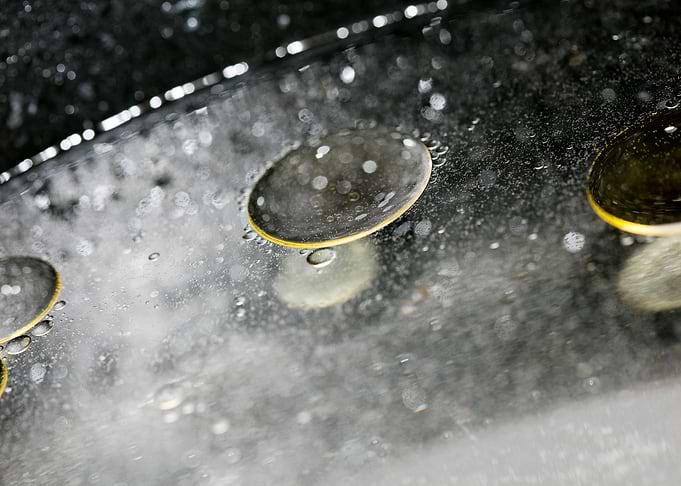 Oil bubbles on water macro