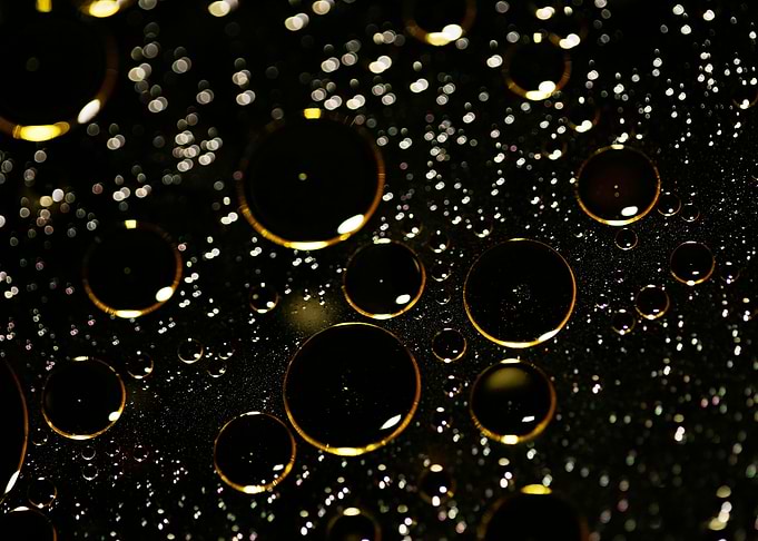 Oil bubbles on water macro