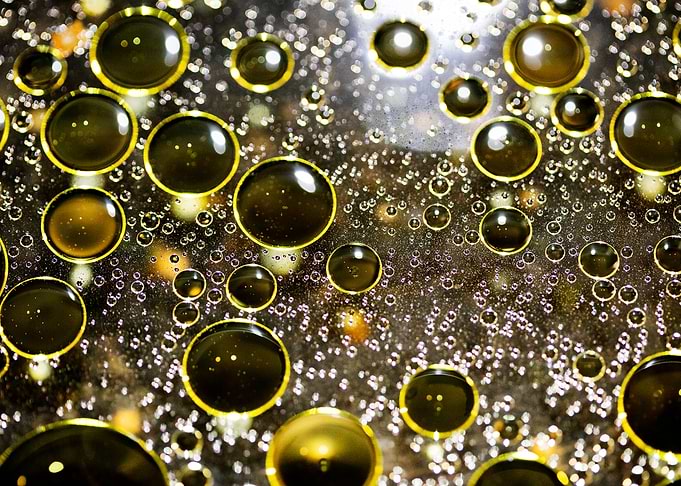 Oil bubbles on water macro
