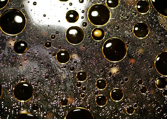 Oil bubbles on water macro