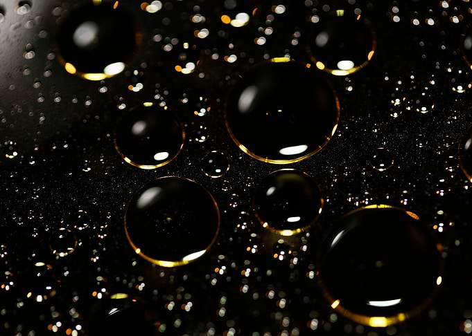 Oil bubbles on water macro