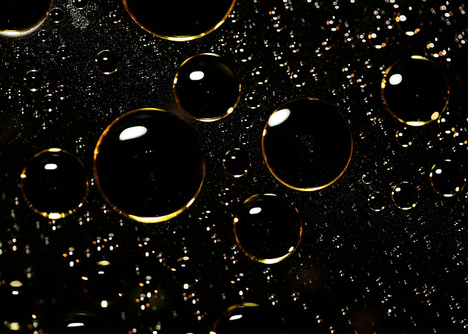 Oil bubbles on water macro