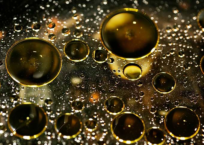 Oil bubbles on water macro