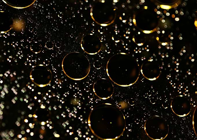 Oil bubbles on water macro
