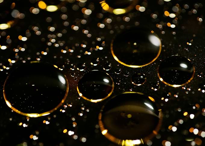 Oil bubbles on water macro