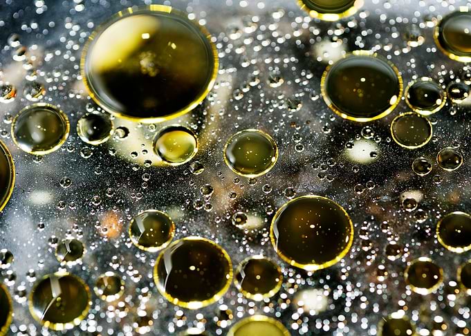 Oil bubbles on water macro