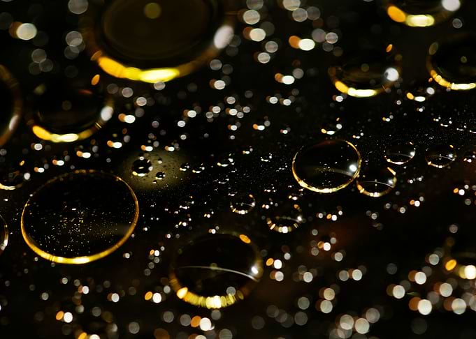 Oil bubbles on water macro