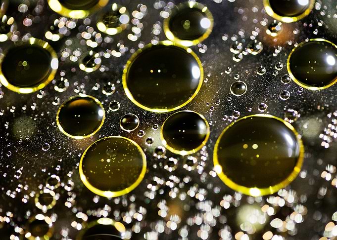 Oil bubbles on water macro