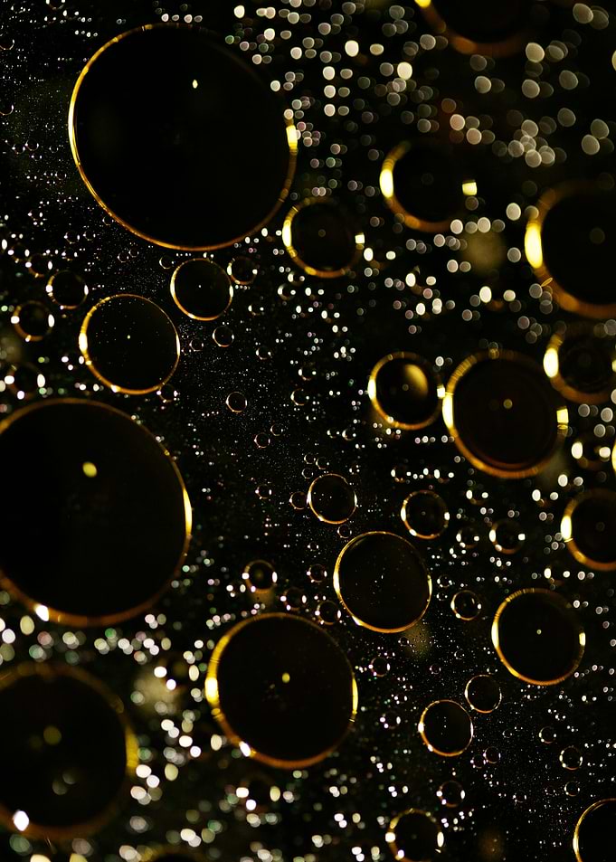 Oil bubbles on water macro