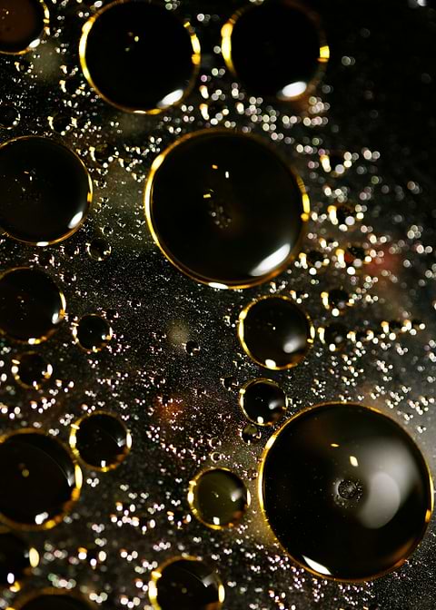 Oil bubbles on water macro