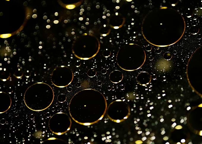 Oil bubbles on water macro