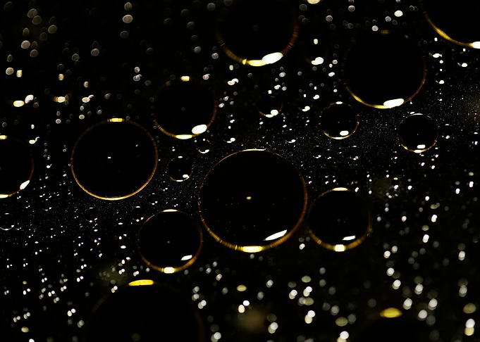 Oil bubbles on water macro