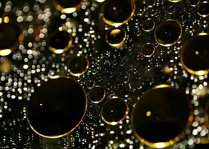 Oil bubbles on water macro