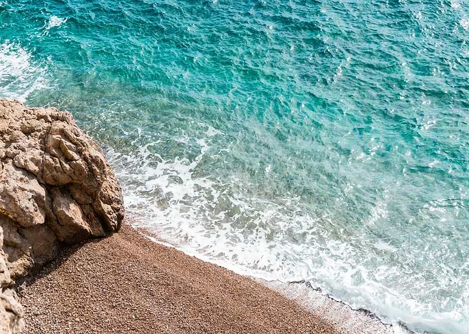 Stone Beach and Blue Sea