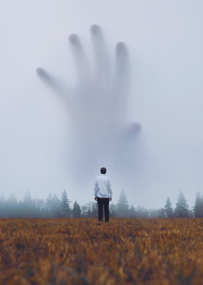 Scary Hand in Veiled Sky