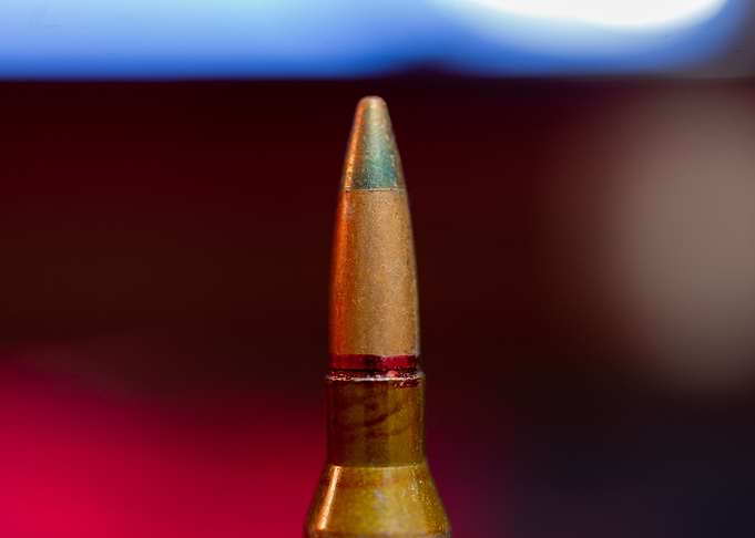 Rifle ammo on blurred