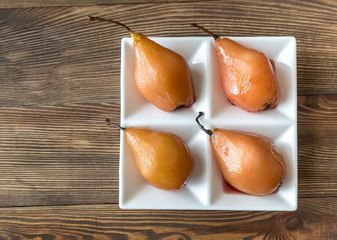 Poached pears on the plate