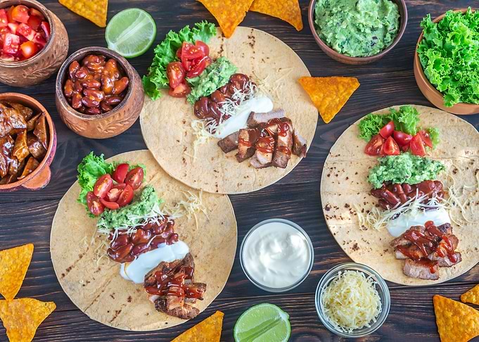 Tacos on wooden table