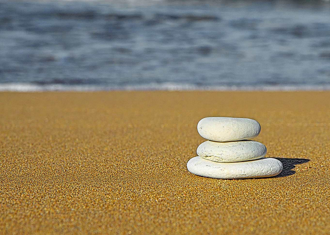 Stones Stacked on Beach