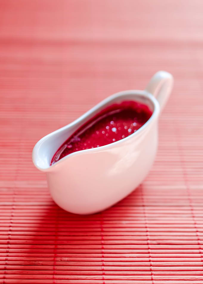 Sauce boat with red sauce