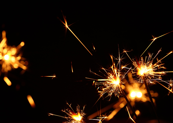 Sparklers over black