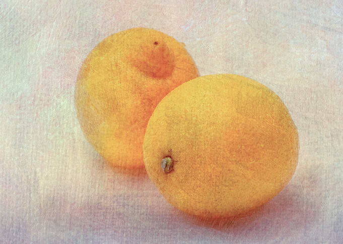 Two Yellow Lemon Fruits
