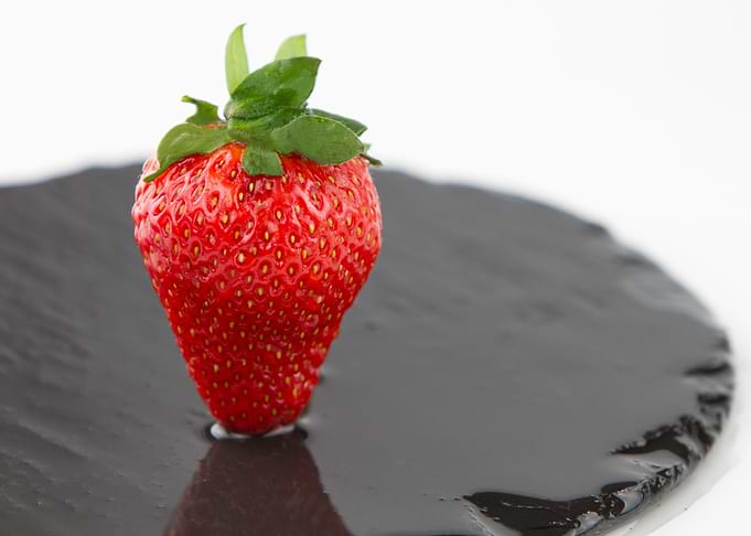 Strawberry stand on slate