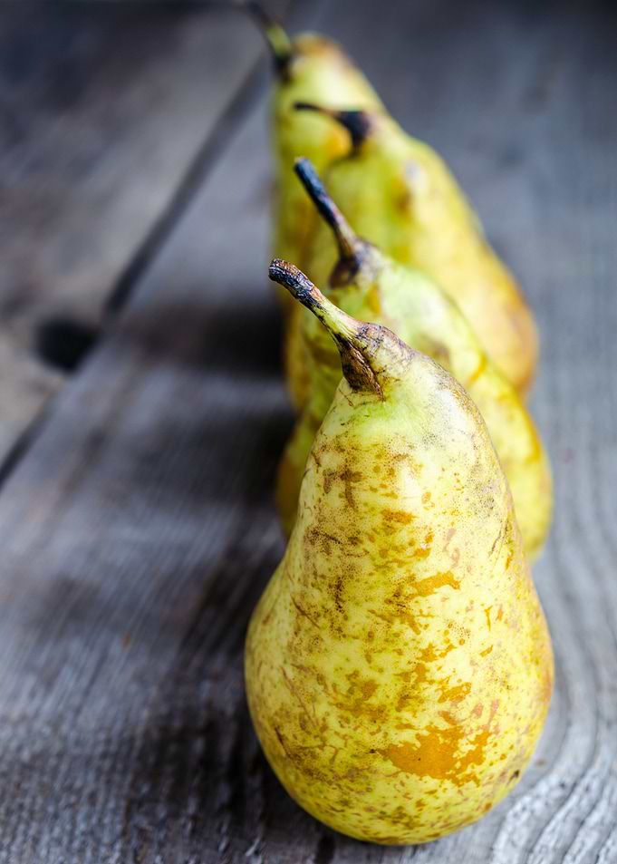 Yellow pears in a row
