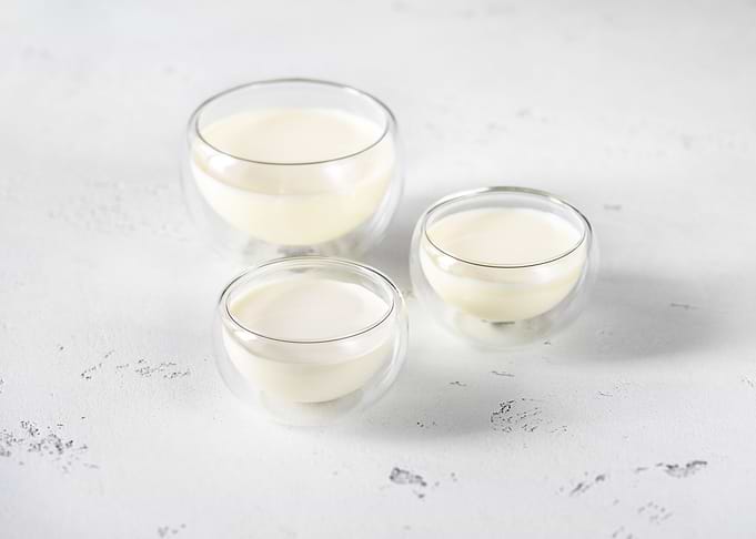 Bowls of milk and cream