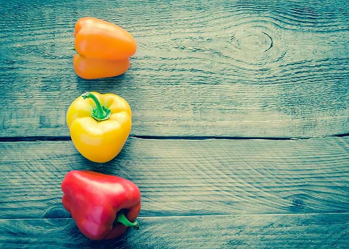 Bell peppers on the board