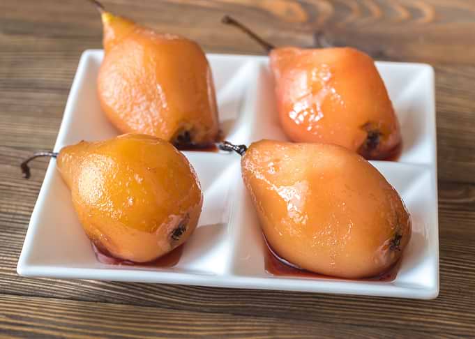 Poached pears in rose wine
