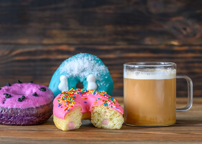 Donuts with cup of coffee