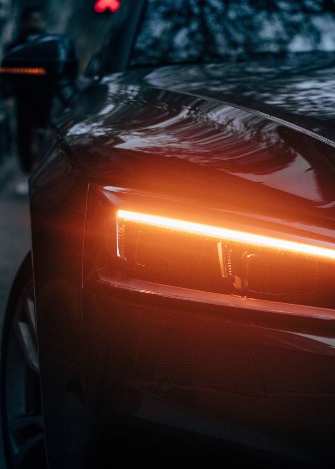 orange car on road