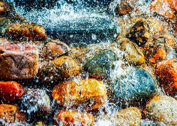 Wet Stones Running Water
