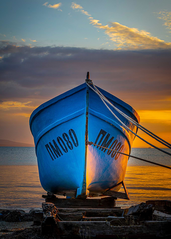 Fishing boat at sunset